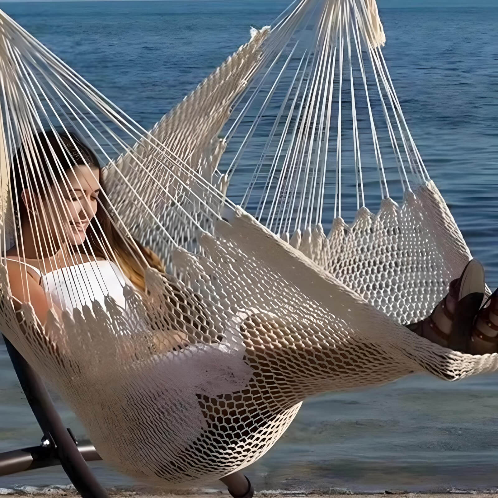 Copy-of_girl-sitting-in-a-large-hammock-swing