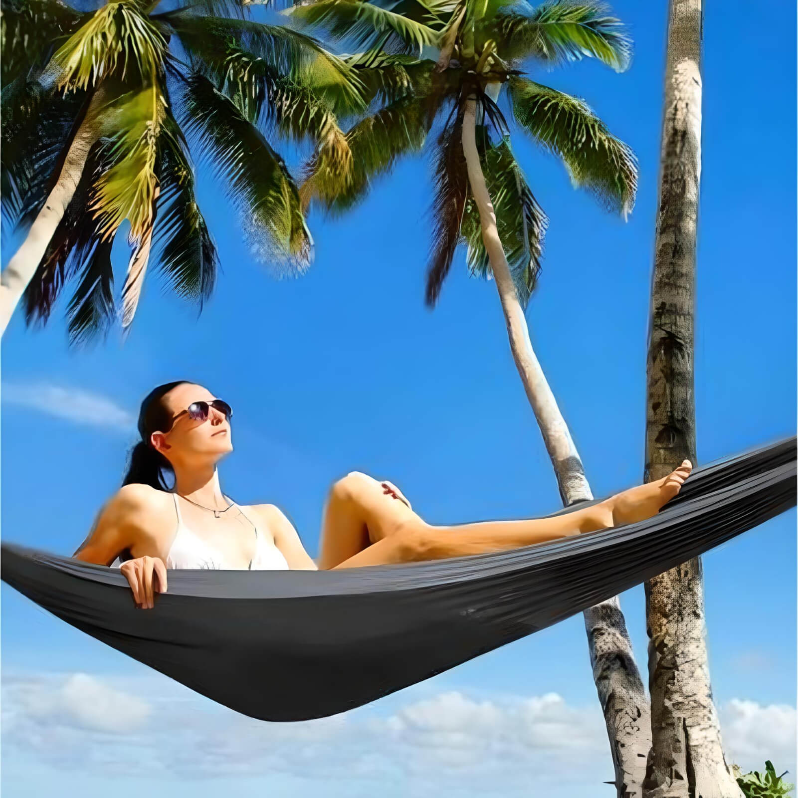 Girl-laying-in-back-pack-hammock