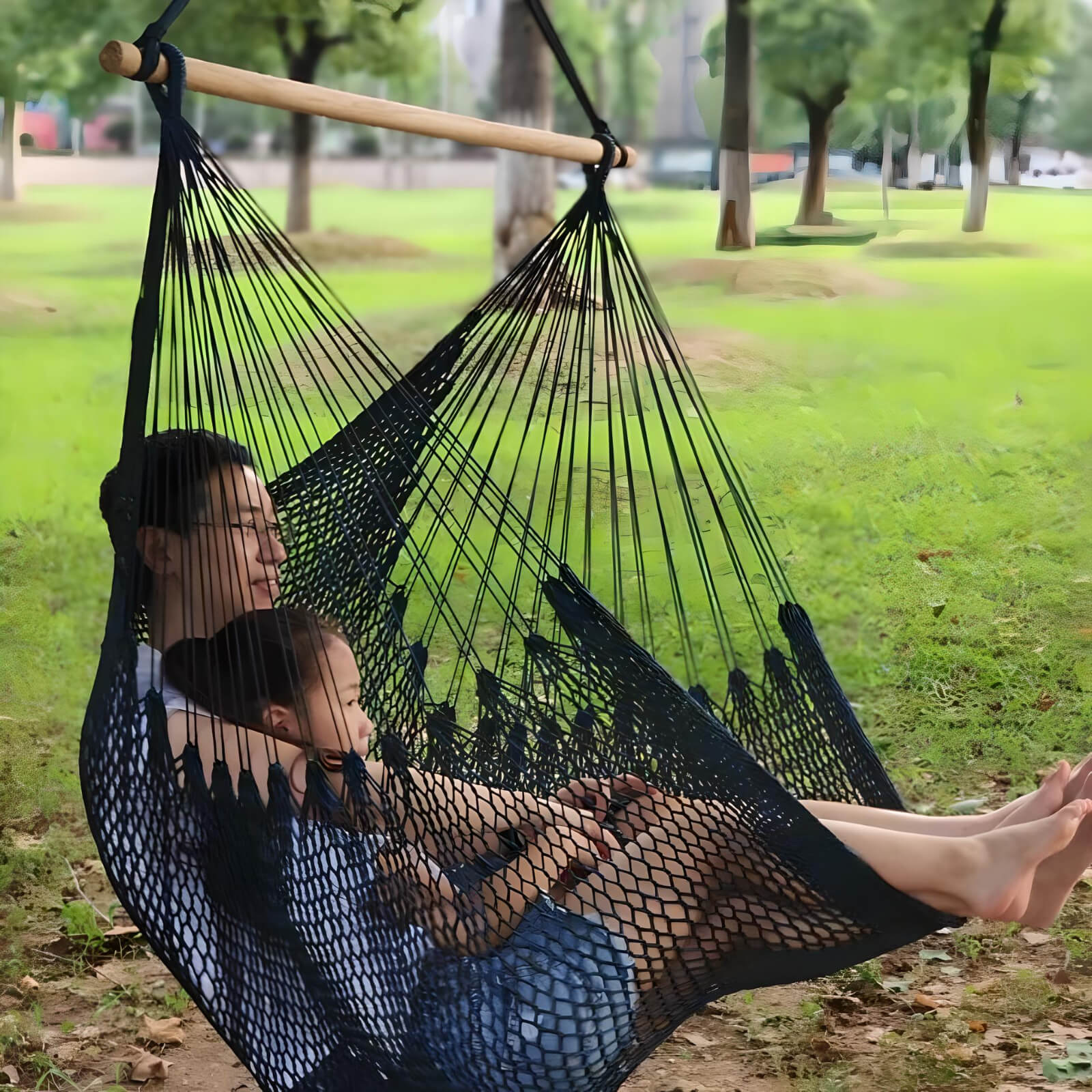 a-man-and-girl-sitting-on-a-Caribbean-hammocks