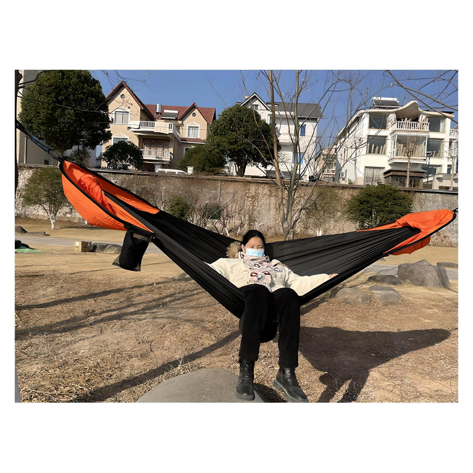 a-women-sleeping-on-a-tent-hammock