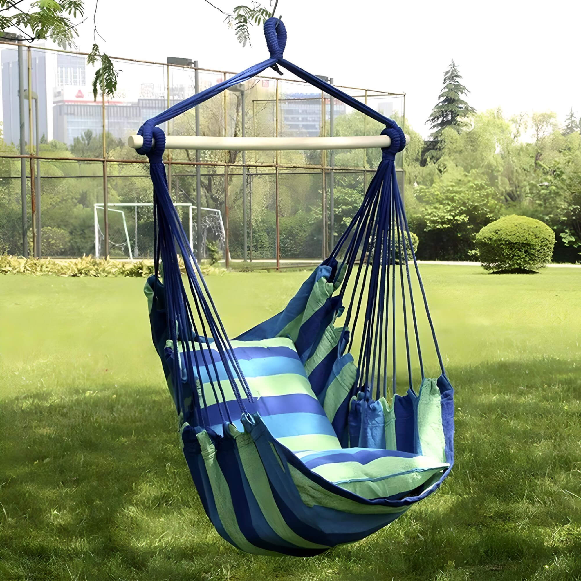 canvas-hammock-chair-hanging-in-yard