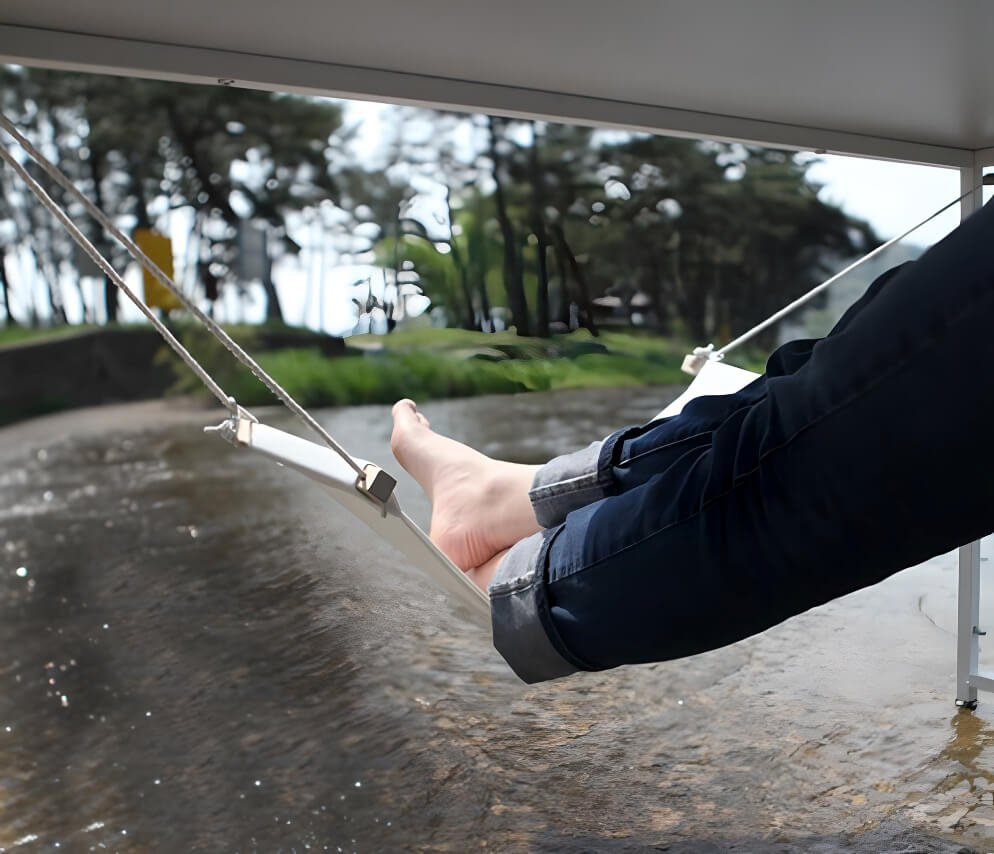 under-desk-hammock-footrest-hanged-outside-in-the-nature