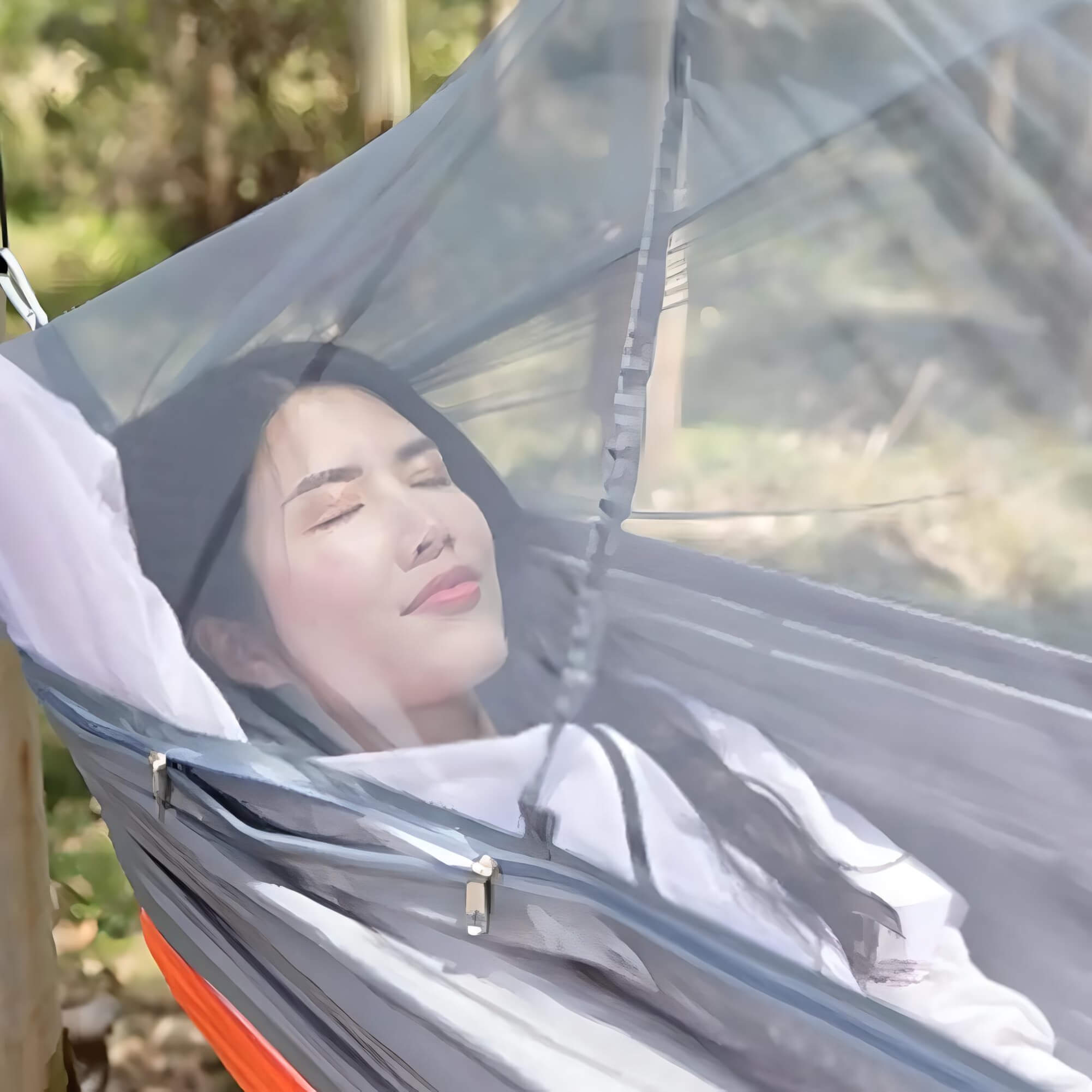 back-packing-tree-tent-girl-laying-in-hammock