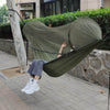 camping-hammock-with-mosquito-net-girl-sitting