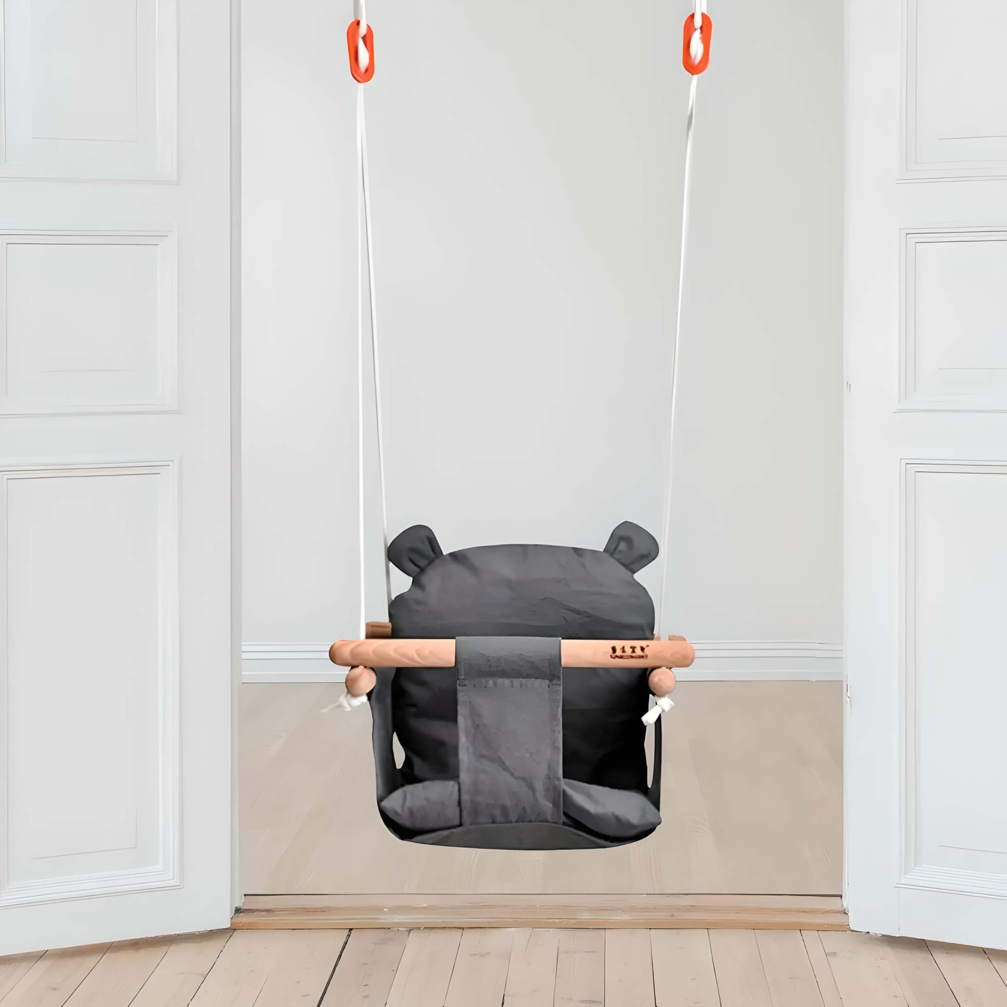 canvas-boho-baby-swing-in-front-of-door-image