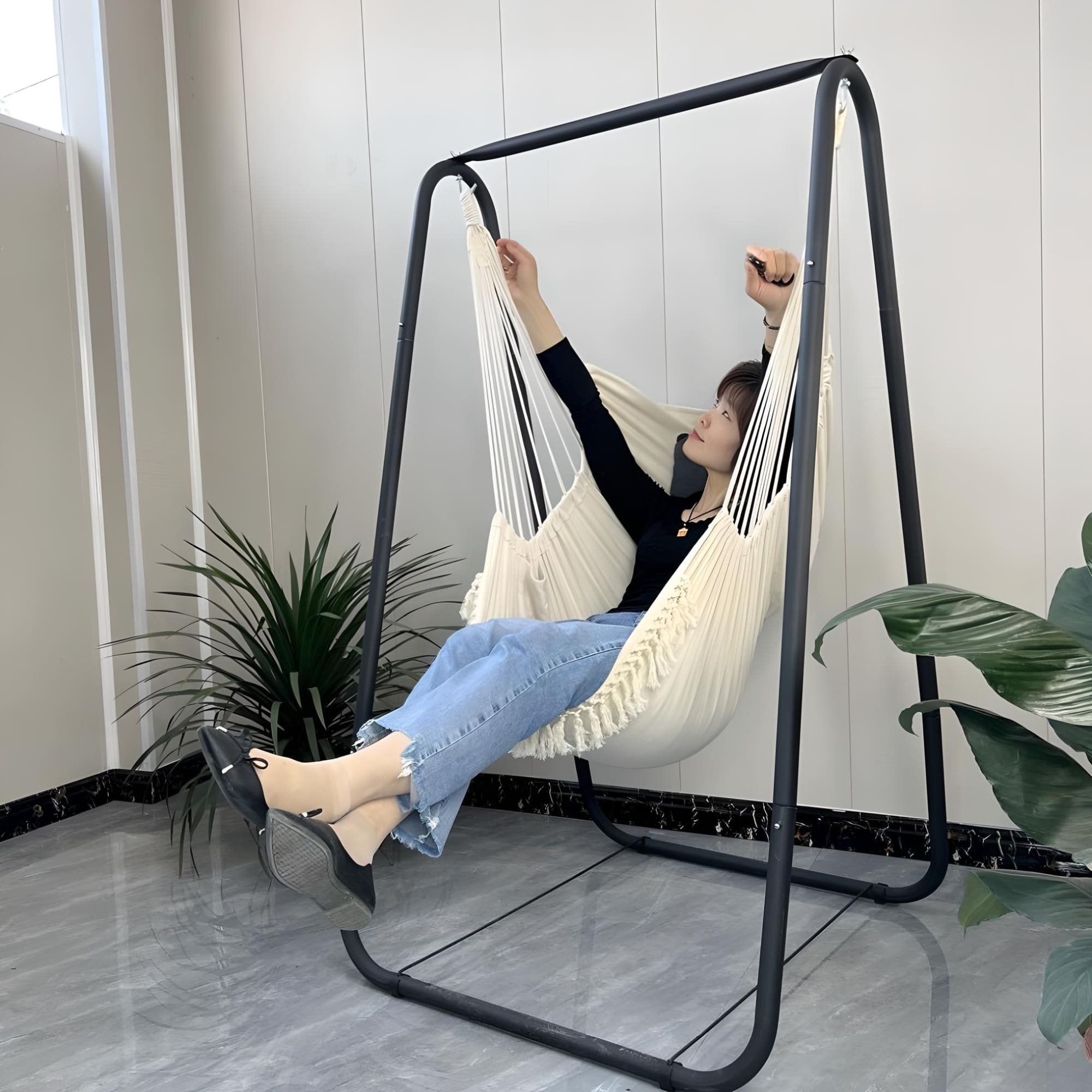 girl-enjoy-of-single-hammock-chair-stand