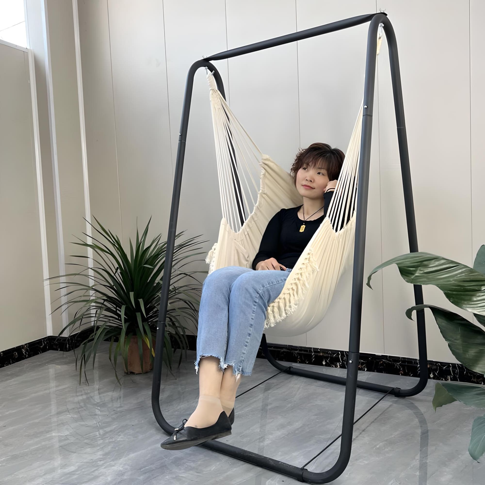 girl-relax-with-single-hammock-chair-stand