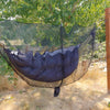 hammock-with-bug-screen-hanging-in-pool