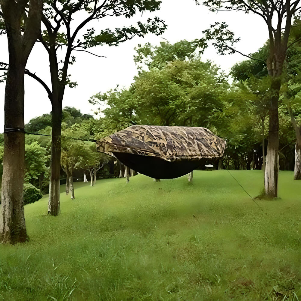 hammock-with-mosquito-net-and-rainfly-hanging-in-forest